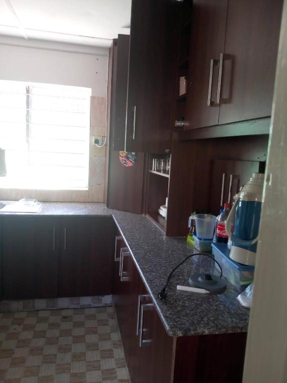 Kuchyň nebo kuchyňský kout v ubytování Kenya Inn