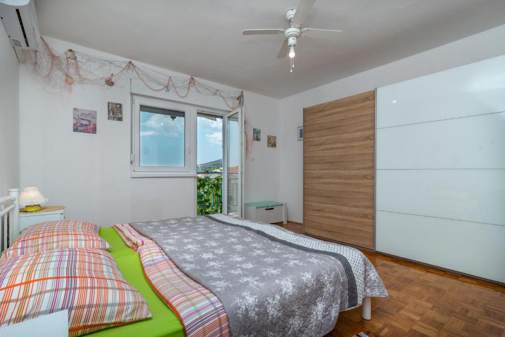 Posteľ alebo postele v izbe v ubytovaní Apartment Radja