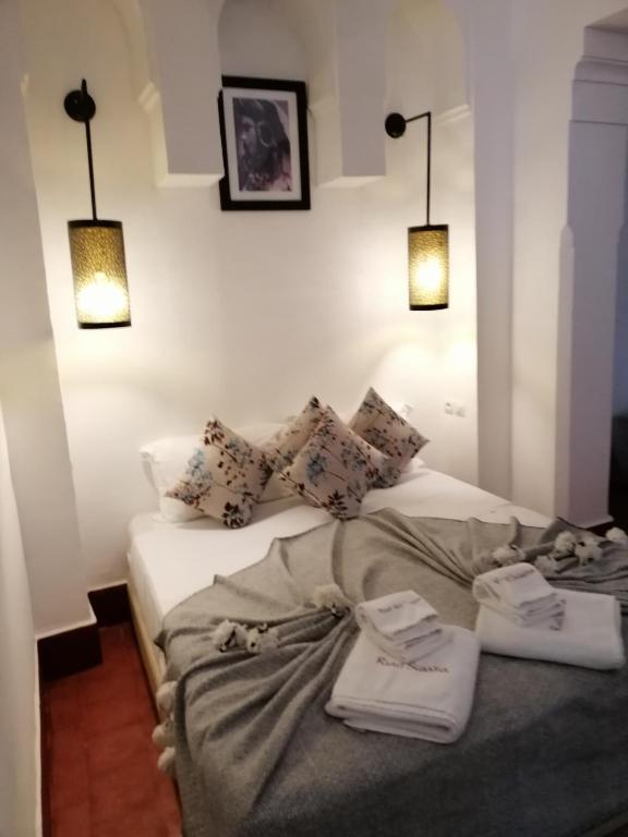 Postel nebo postele na pokoji v ubytování Riad Swaka