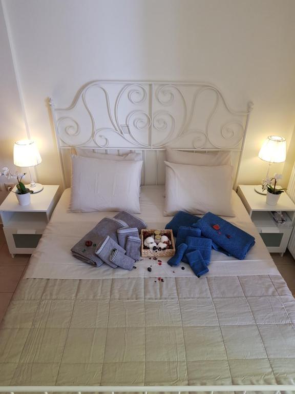 Posteľ alebo postele v izbe v ubytovaní 'Seaside Paradise' Elegant Apartment in Nea Makri