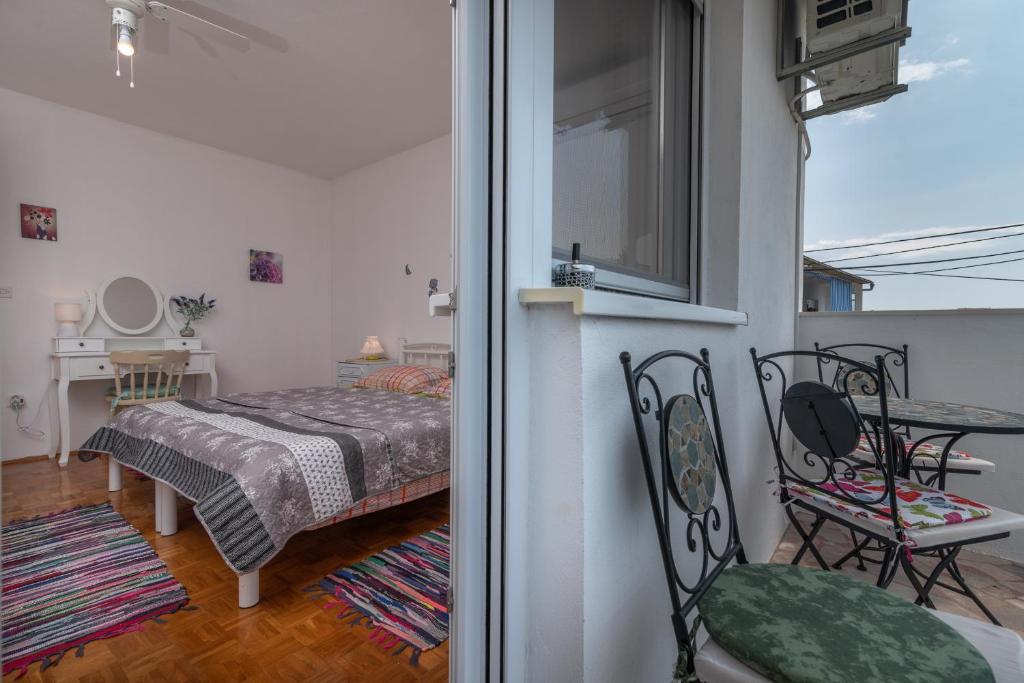 Posteľ alebo postele v izbe v ubytovaní Apartment Radja