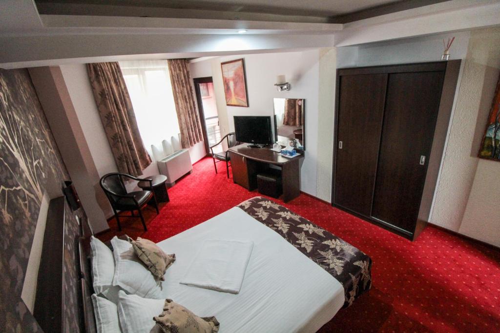 TV a/nebo společenská místnost v ubytování Hotel Razvan