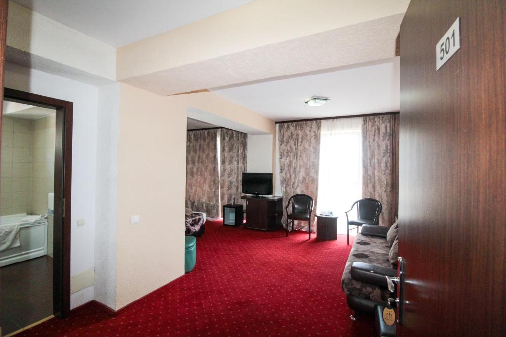 TV a/nebo společenská místnost v ubytování Hotel Razvan