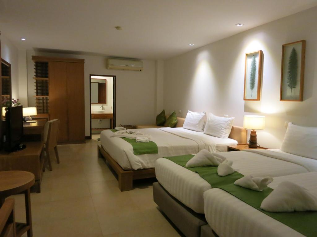 Postel nebo postele na pokoji v ubytování Islanda Resort Hotel