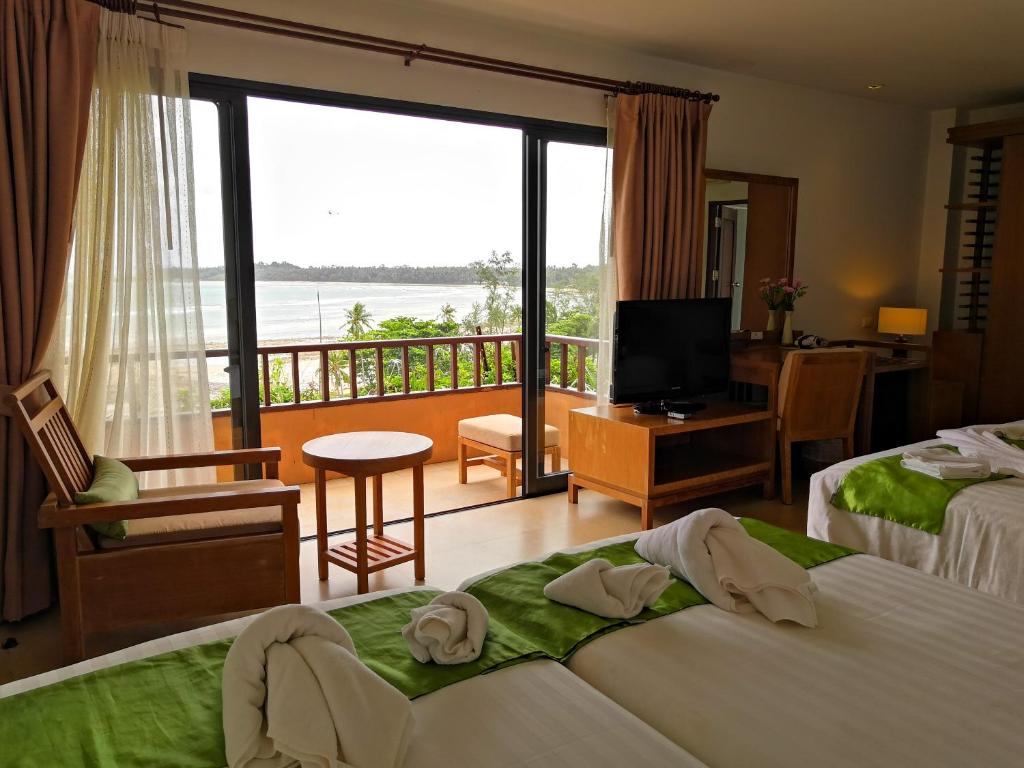 Postel nebo postele na pokoji v ubytování Islanda Resort Hotel
