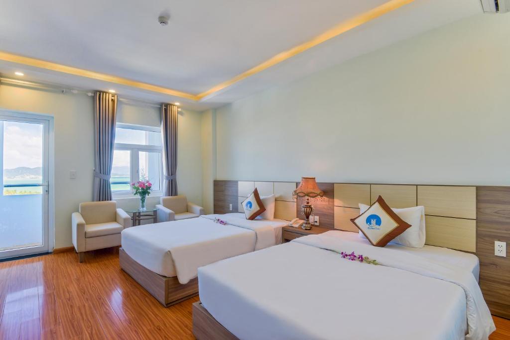 Giường trong phòng chung tại Sky Beach D20 Nha Trang