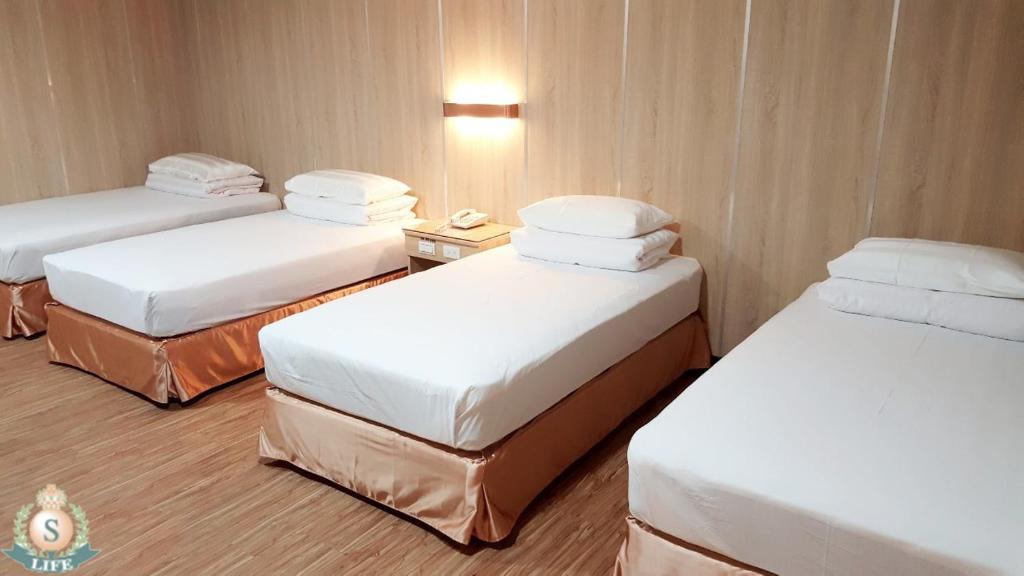 Postel nebo postele na pokoji v ubytování Life Leisure Resort