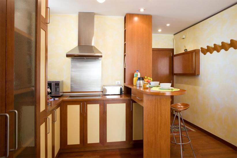 A kitchen or kitchenette at Gaudi Views Apartment
