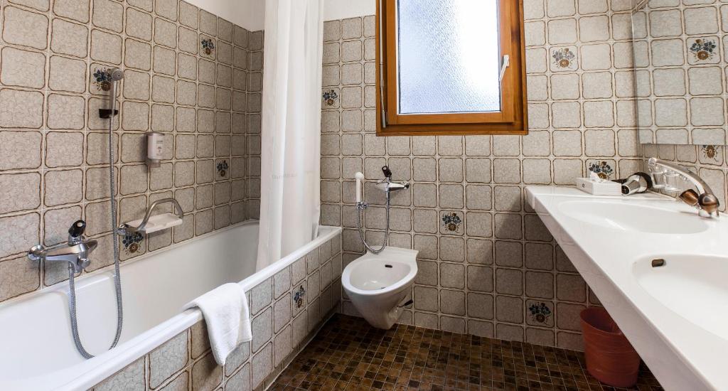 Koupelna v ubytování Residenz Alpina im Kurhaus