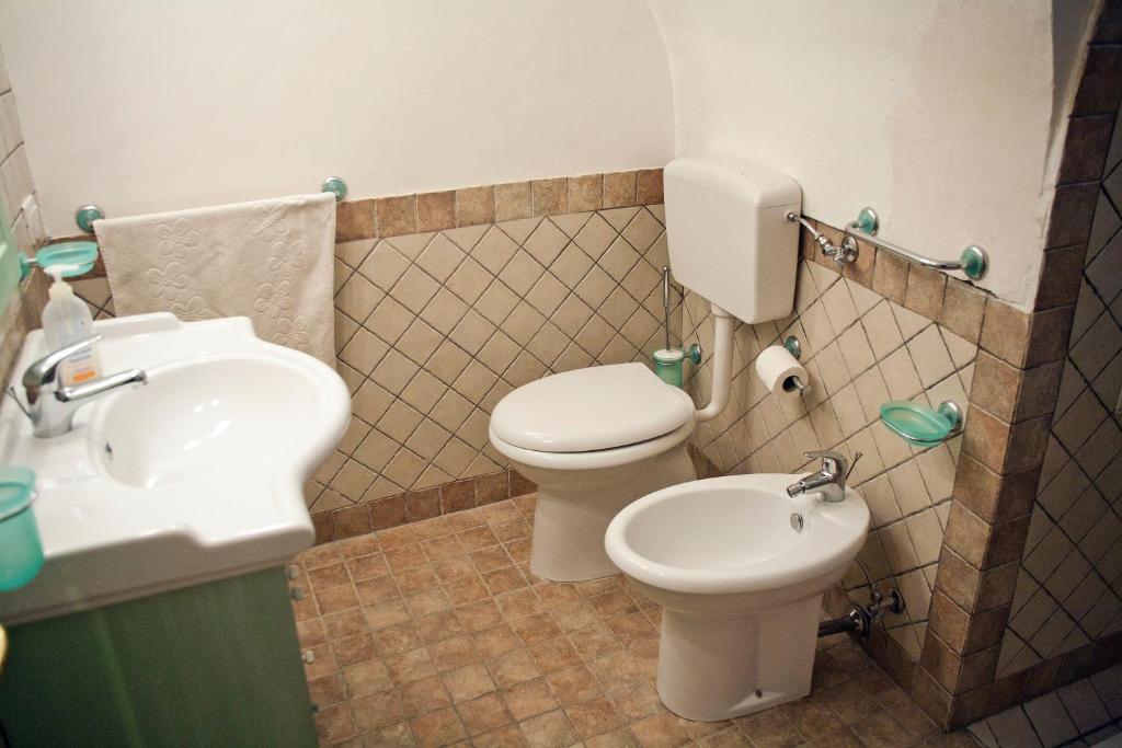 Koupelna v ubytování Residencefusaro appartamenti Specchia