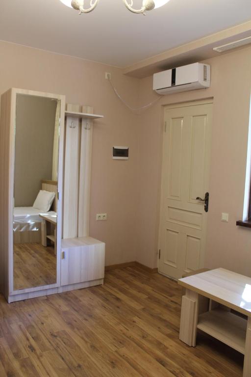 Postel nebo postele na pokoji v ubytování Emis Hotel