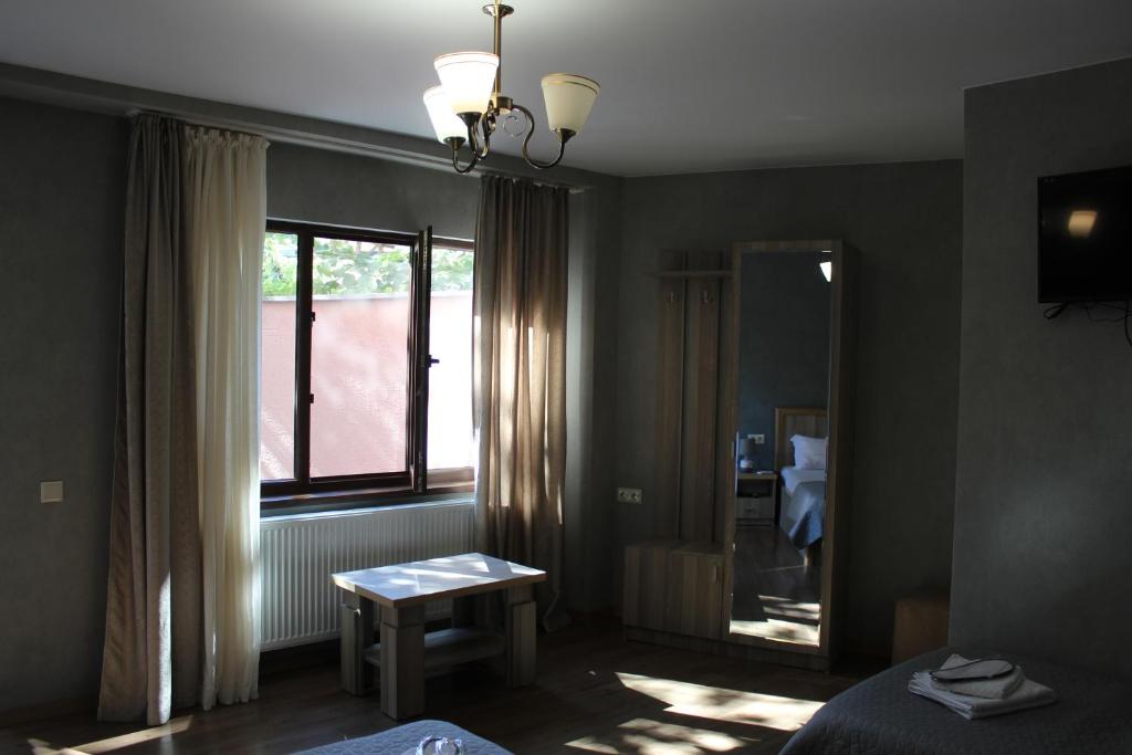 Postel nebo postele na pokoji v ubytování Emis Hotel