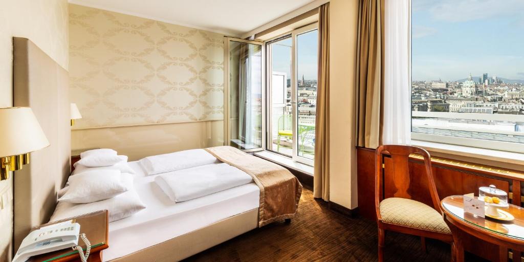 Voodi või voodid majutusasutuse Hotel Am Parkring toas