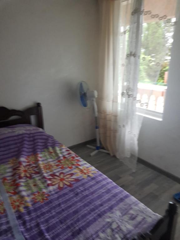 Postel nebo postele na pokoji v ubytování Gios Guest House