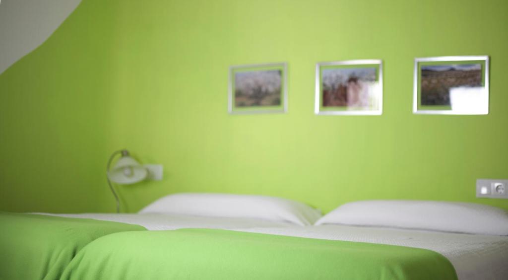 Postel nebo postele na pokoji v ubytování Posada del Candil