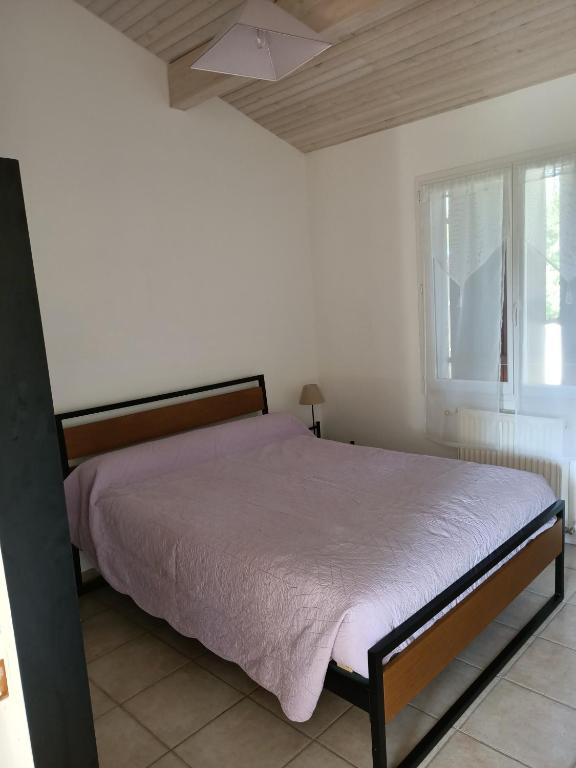 Postel nebo postele na pokoji v ubytování Appartement Gerezitenia