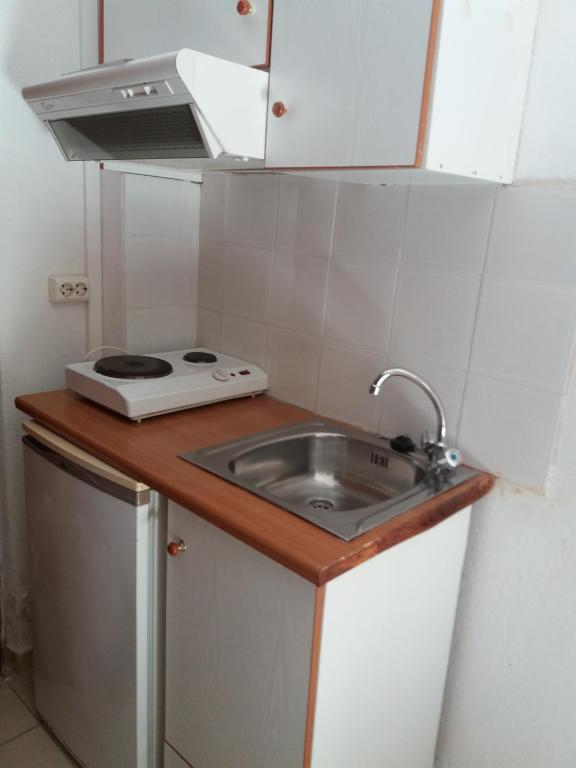 Kuchyň nebo kuchyňský kout v ubytování Hotel Anatoli Apartments