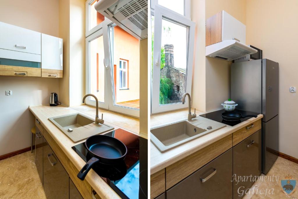 Kuchyň nebo kuchyňský kout v ubytování Apartamenty Galicja