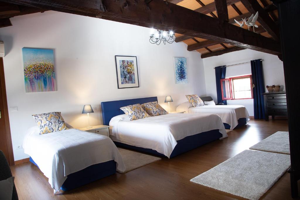 Postel nebo postele na pokoji v ubytování Palazzo Strassoldo bed & breakfast