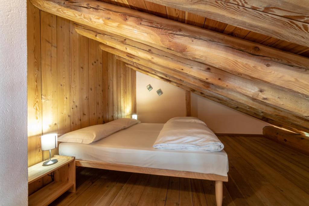 Postel nebo postele na pokoji v ubytování Walsertal Residence