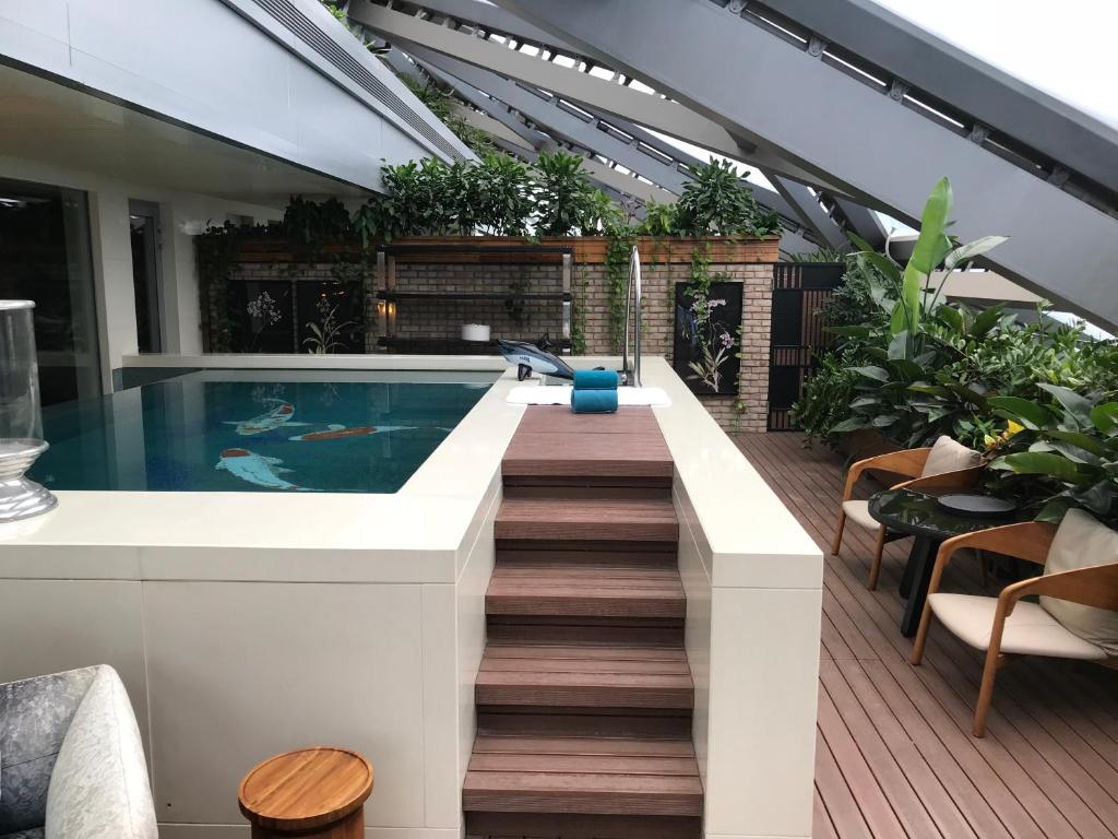 Bazén v ubytování Hotel Éclat Beijing nebo v jeho okolí