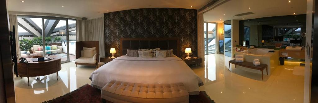 Postel nebo postele na pokoji v ubytování Hotel Éclat Beijing