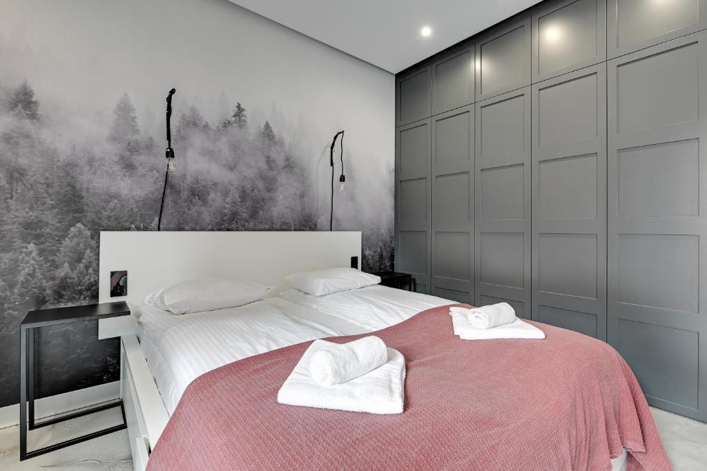 Postel nebo postele na pokoji v ubytování Comfort Apartments Rajska