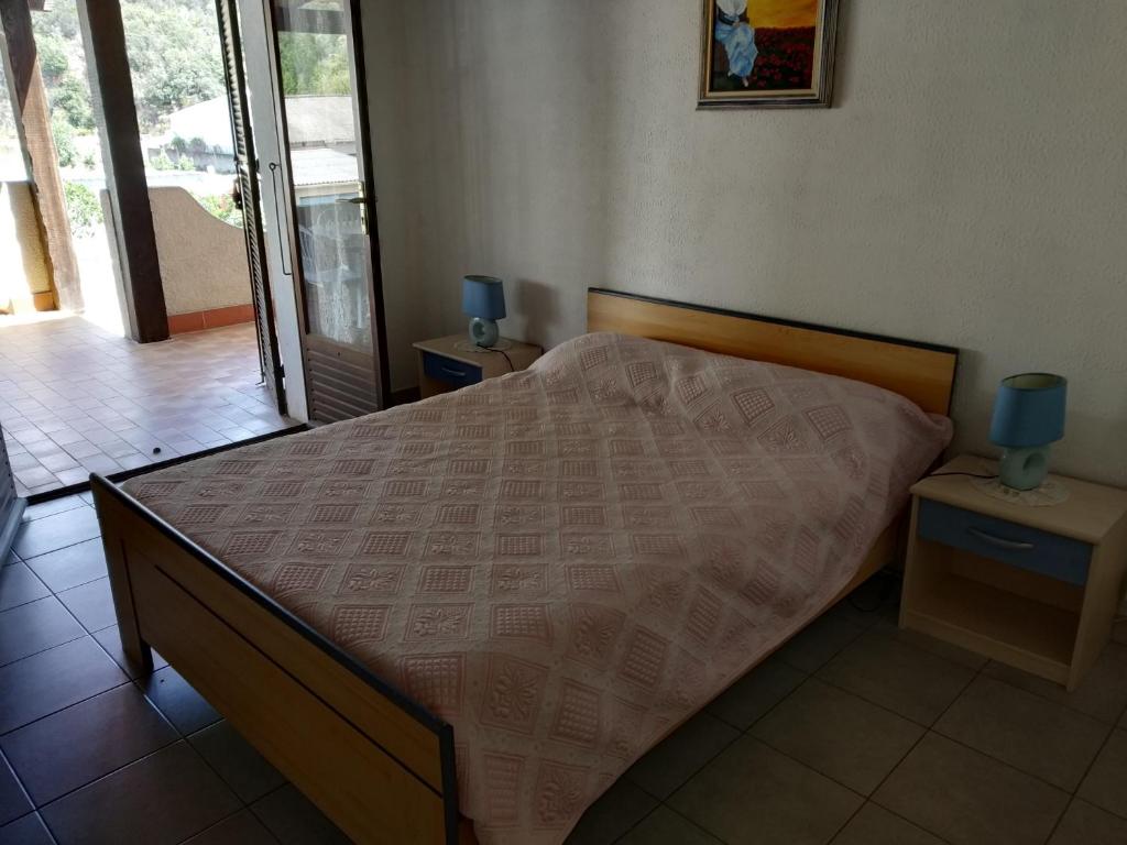 Postel nebo postele na pokoji v ubytování U Palmu