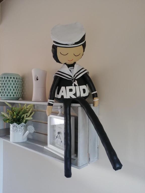 Certifikát, hodnocení, plakát nebo jiný dokument vystavený v ubytování Larida