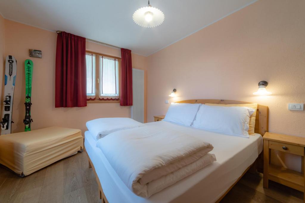 Postel nebo postele na pokoji v ubytování Walsertal Residence