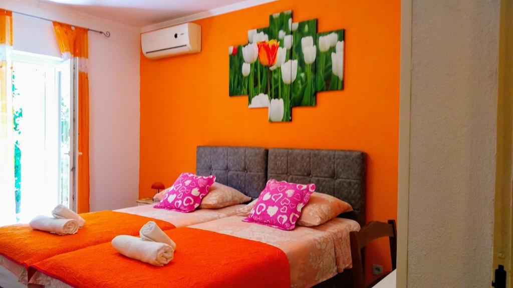 Posteľ alebo postele v izbe v ubytovaní Apartments Desa Petric