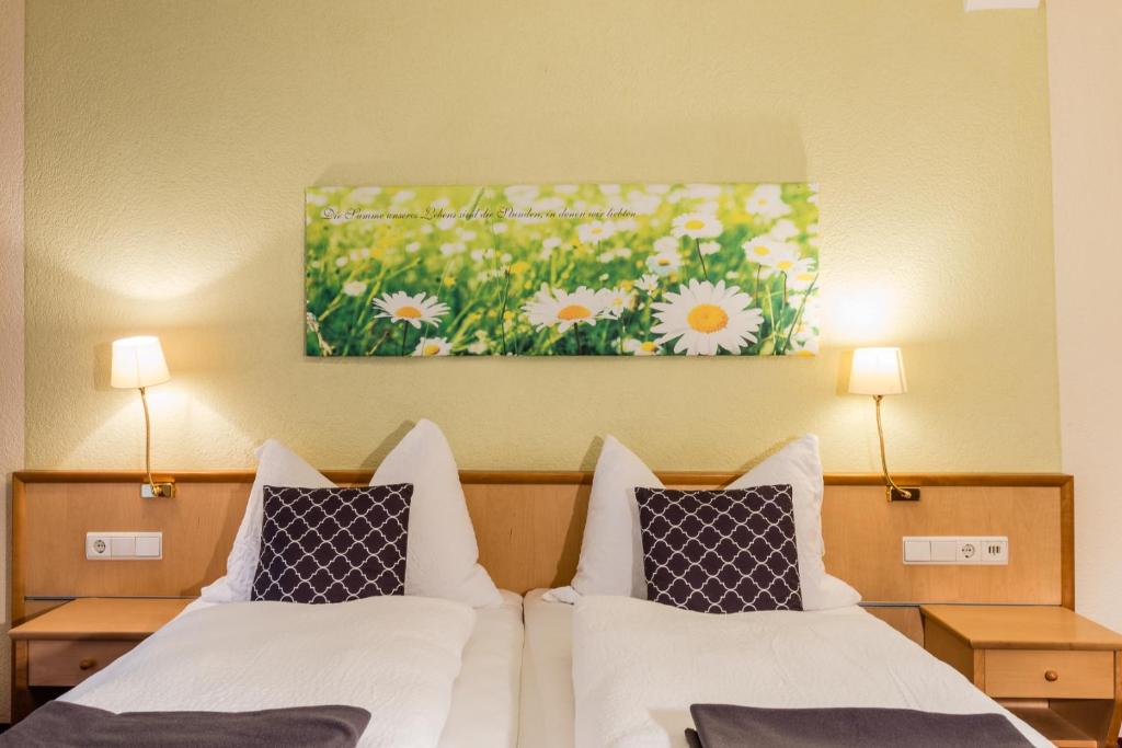 Postel nebo postele na pokoji v ubytování Hotel Wiesenhof