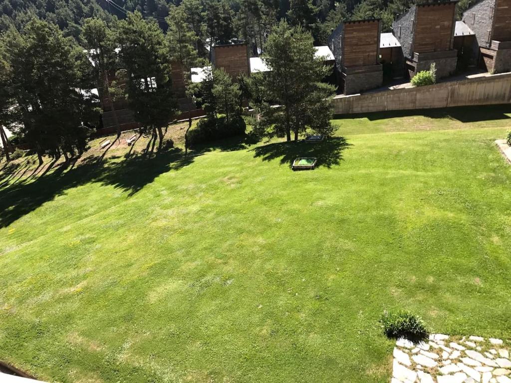Zahrada ubytování Acogedor apartamento en La Molina