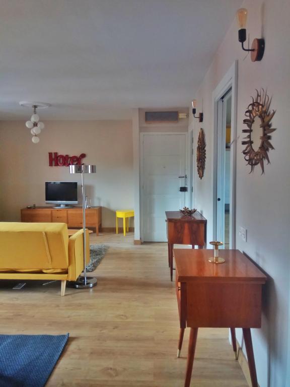 TV a/nebo společenská místnost v ubytování Una Ventana al Naranco