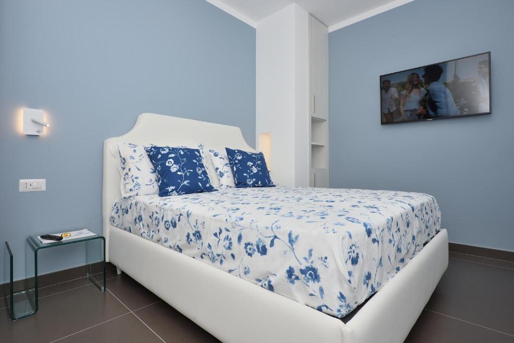 Łóżko lub łóżka w pokoju w obiekcie Costa d'Amalfi Apartments