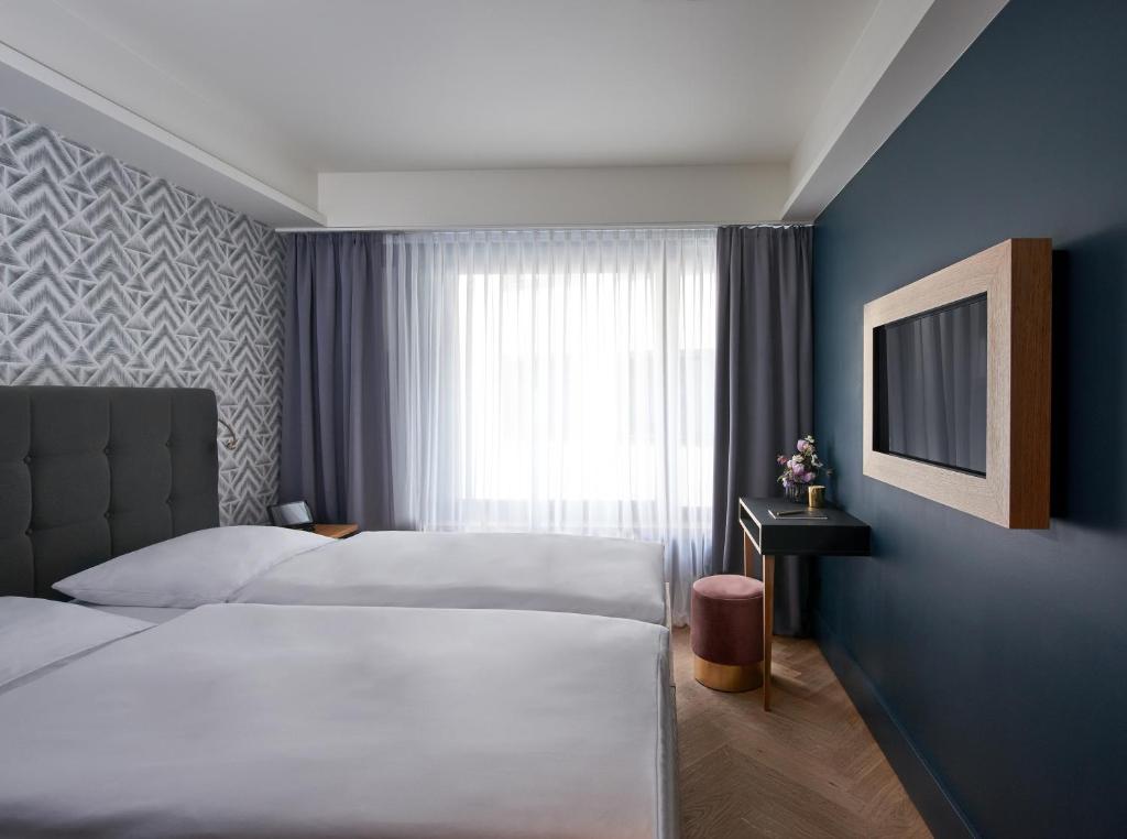 Postel nebo postele na pokoji v ubytování Hotel MIO by AMANO