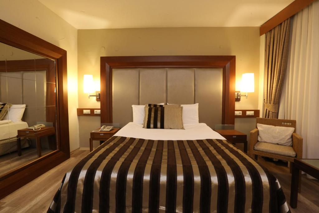 Postel nebo postele na pokoji v ubytování Grand Terme Hotel
