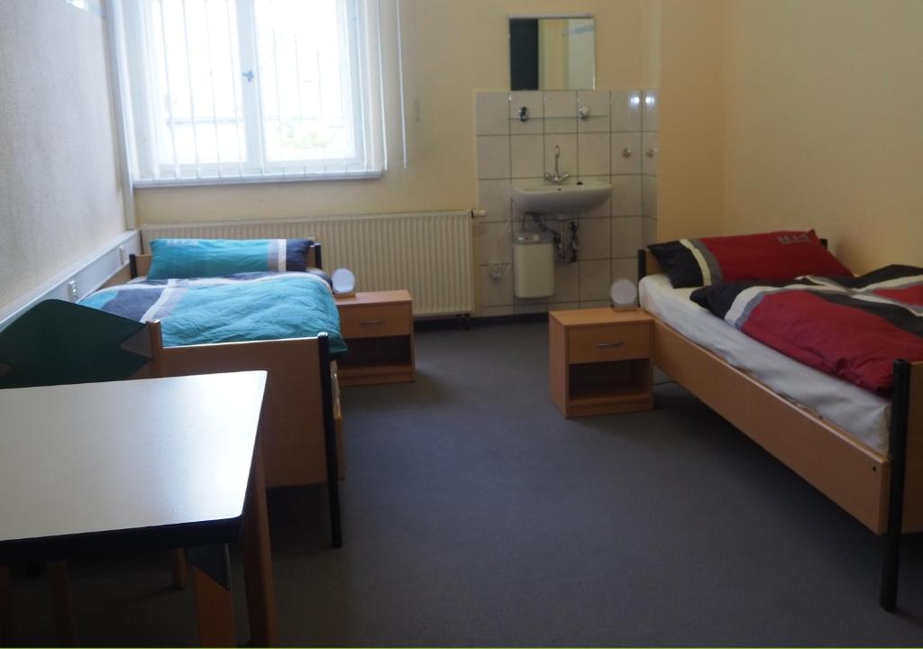 Postel nebo postele na pokoji v ubytování Hostel jo-si