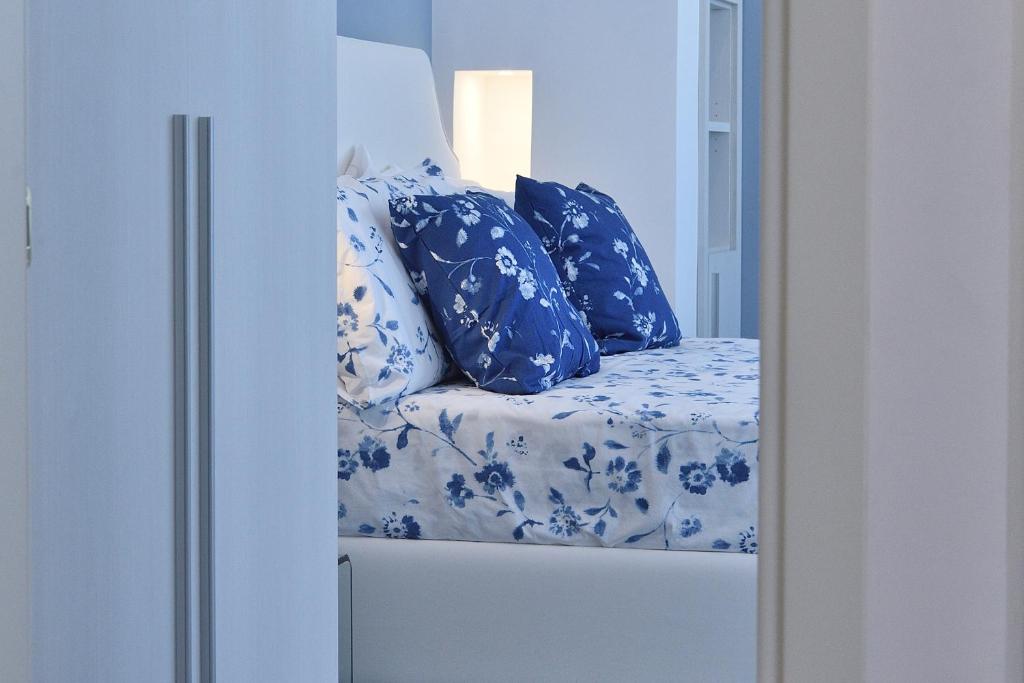 Łóżko lub łóżka w pokoju w obiekcie Costa d'Amalfi Apartments