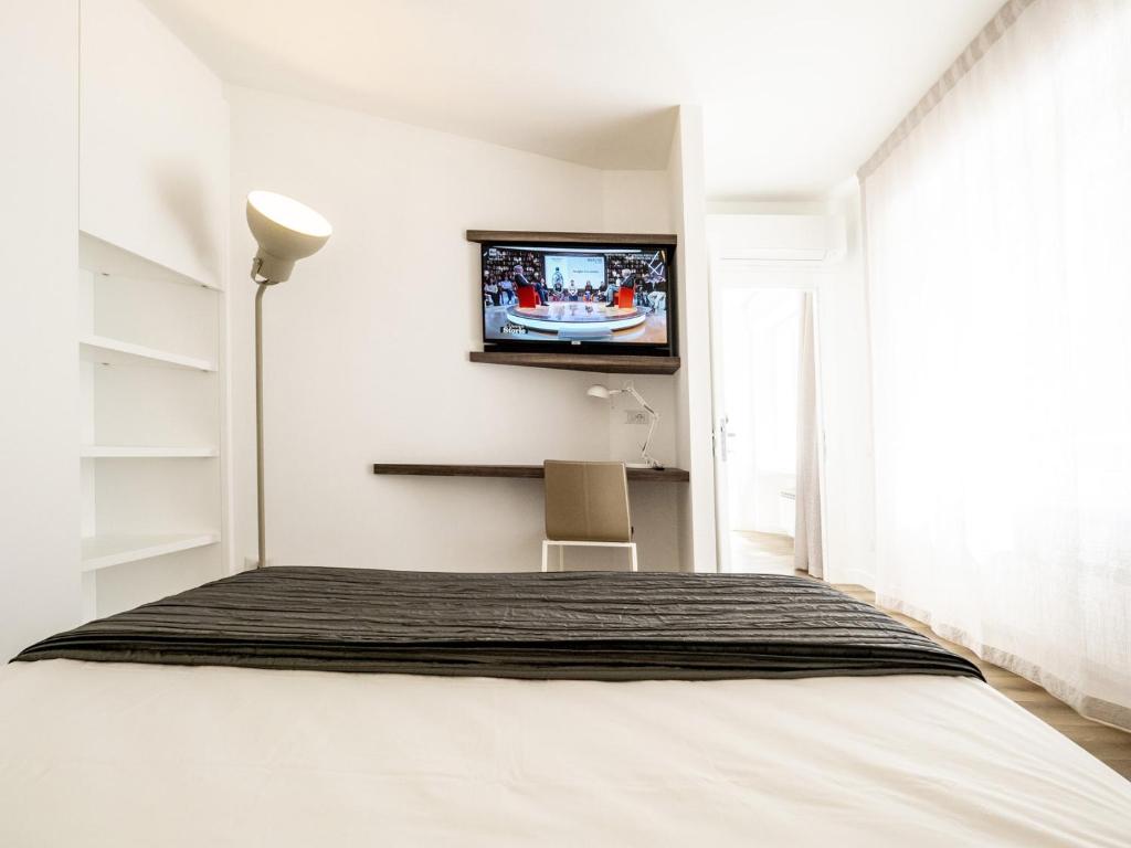 Televízia a/alebo spoločenská miestnosť v ubytovaní Gallery House