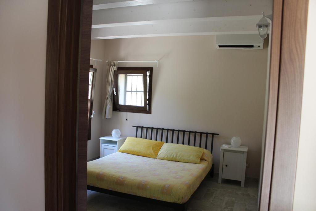 Postel nebo postele na pokoji v ubytování Archi Rooms