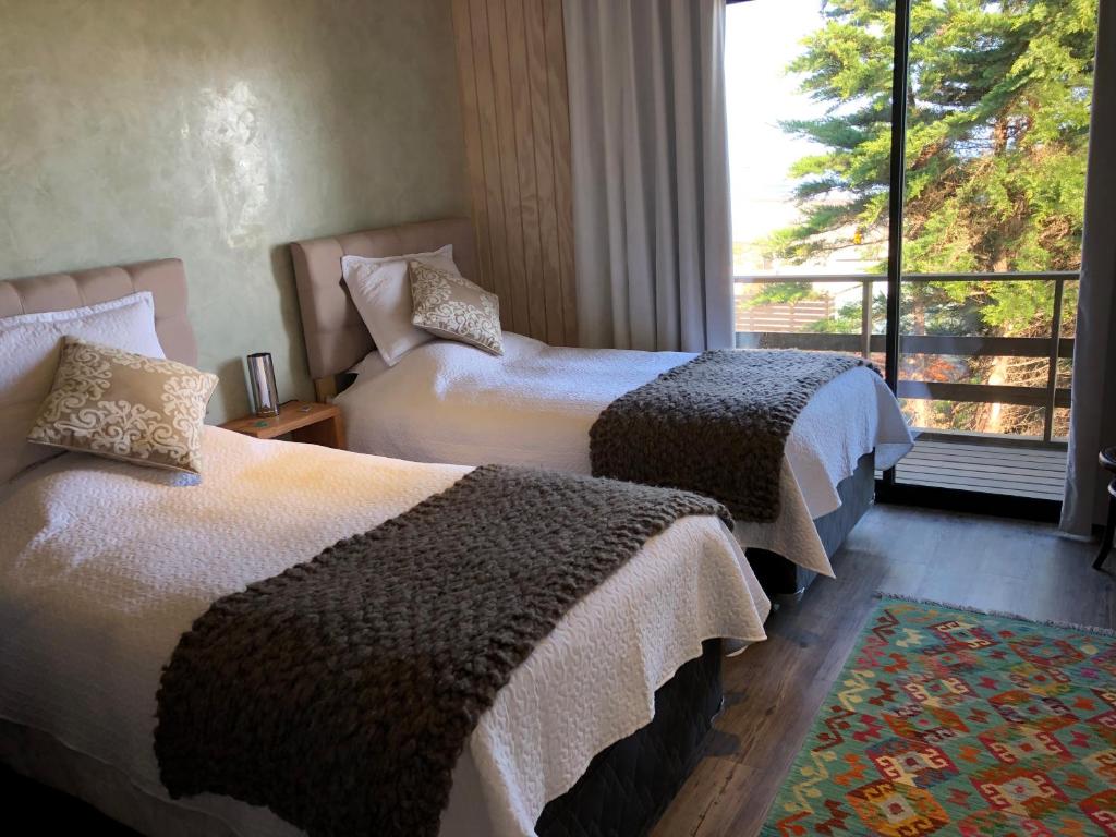 Postel nebo postele na pokoji v ubytování B&B Casa Las Brisas Matanzas