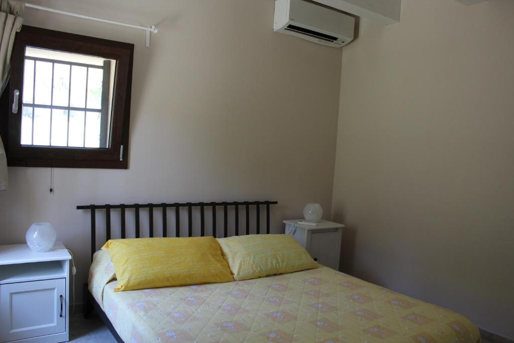 Postel nebo postele na pokoji v ubytování Archi Rooms