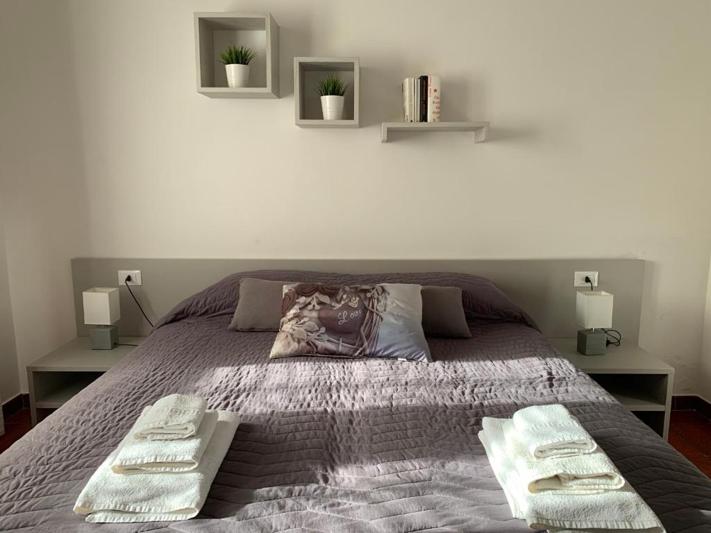 
A bed or beds in a room at Valentina Lovely Rooms
