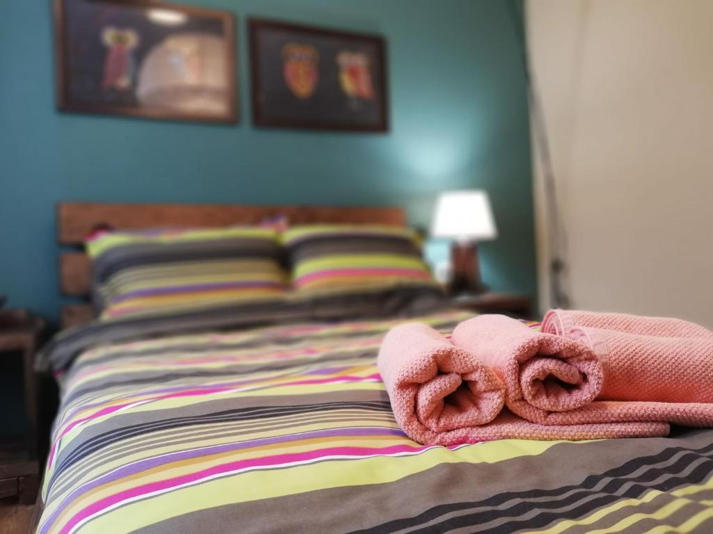 A bed or beds in a room at EskiZ - Our stone home