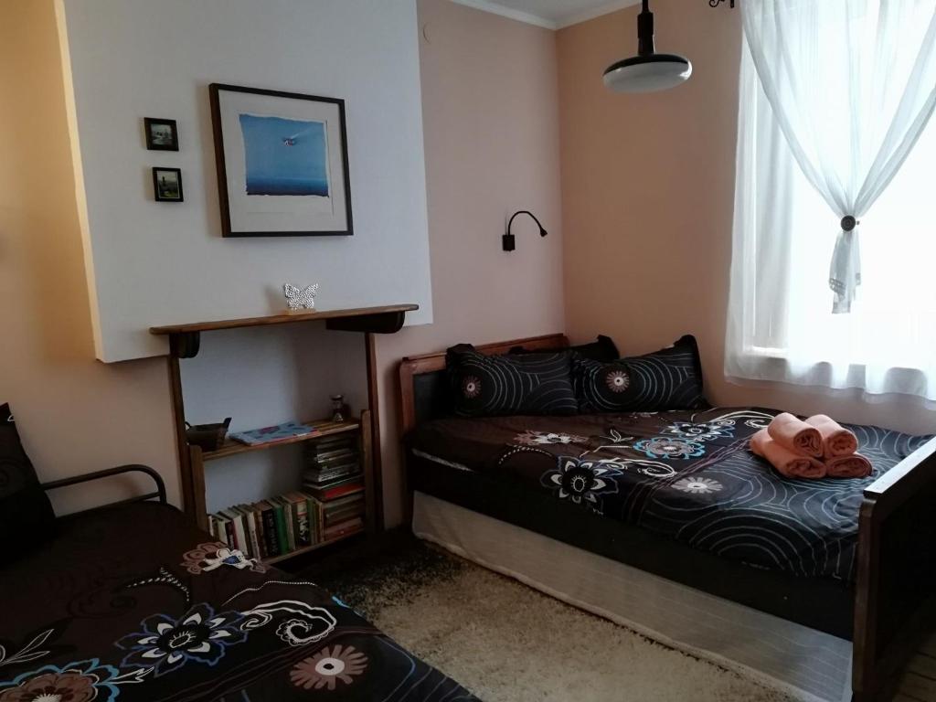 A bed or beds in a room at EskiZ - Our stone home