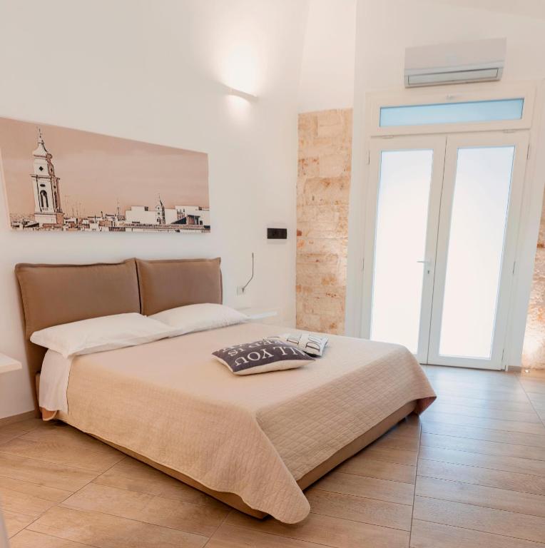 Postel nebo postele na pokoji v ubytování B&B Aurelia