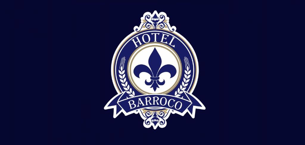 ein Logo für einen Hotelbaroco mit einer Krone in der Unterkunft Hotel Barroco in Puebla