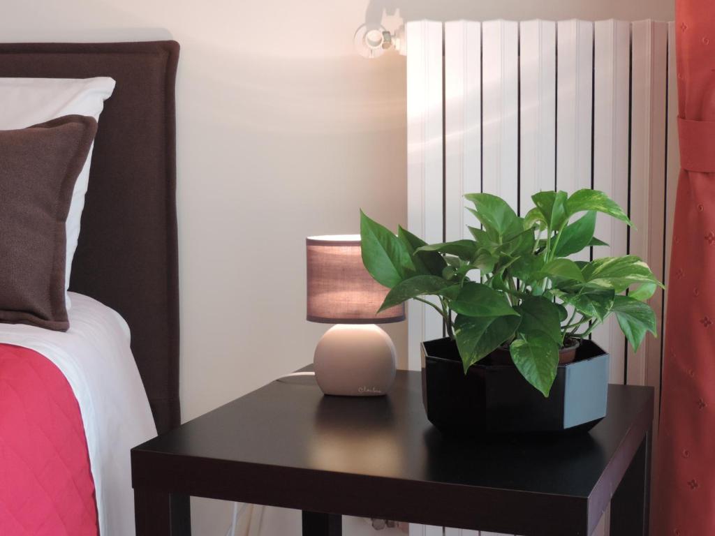 Postel nebo postele na pokoji v ubytování Artemide B&B