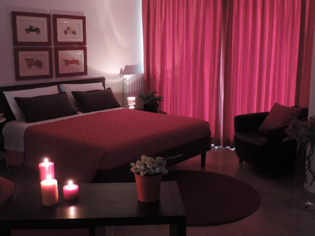 Postel nebo postele na pokoji v ubytování Artemide B&B